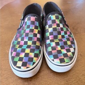 Vans Classic Slip-On shoes in the "Iridescent Check" colorway.